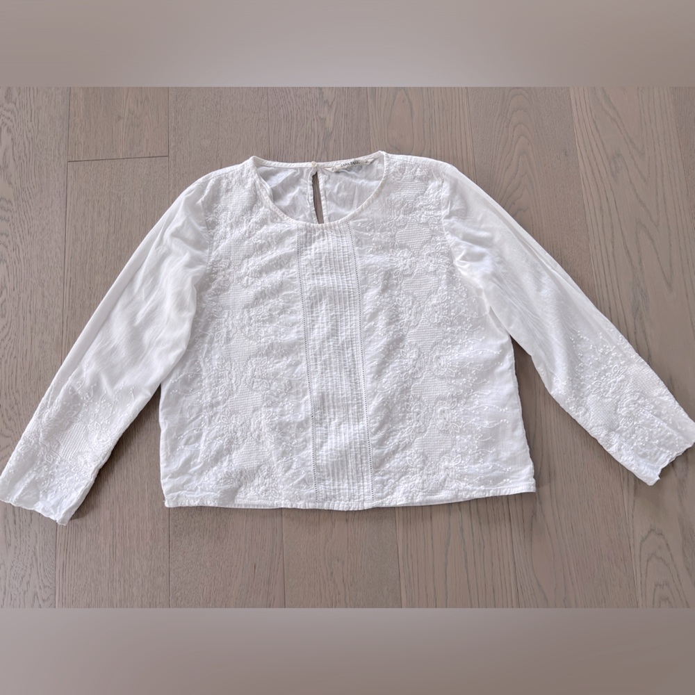 White embroidered white top with long sleeves